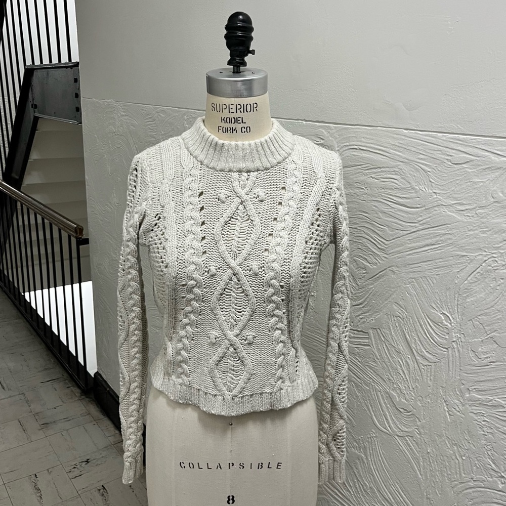 Cropped chunky knit sweater by Rachel Roy, flattering style with high waisted